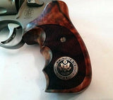 Smith & Wesson 500 pistol grips made of root walnut with a custom silver logo from Bestpistolgrips.