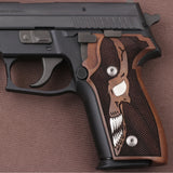 Sig Sauer P226 custom grips made of walnut wood with intricate grain pattern, designed for improved handling and aesthetic appeal.