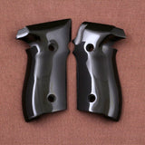Black acrylic Sig Sauer P226 custom grips with textured surface for improved grip and handling.