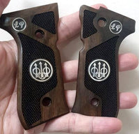 Beretta 92G grips made of walnut with custom logo and initials made of silver. 