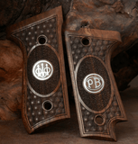Beretta 92S grips made of walnut wood with custom logos made of silver.