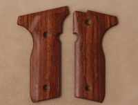 Beretta Cougar 8000 grips made of Rosewood.