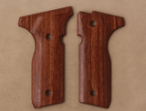 Beretta Cougar 8000 grips made of Rosewood.