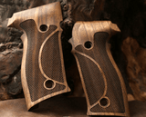 Sig Sauer P226 handgun with custom walnut wood grips by Bestpistolgrips, showing detailed wood grain and grip texture.