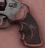 Walnut wood grips for Smith & Wesson 460 .500 X Frame pistol by Bestpistolgrips, showcasing the textured surface and craftsmanship.